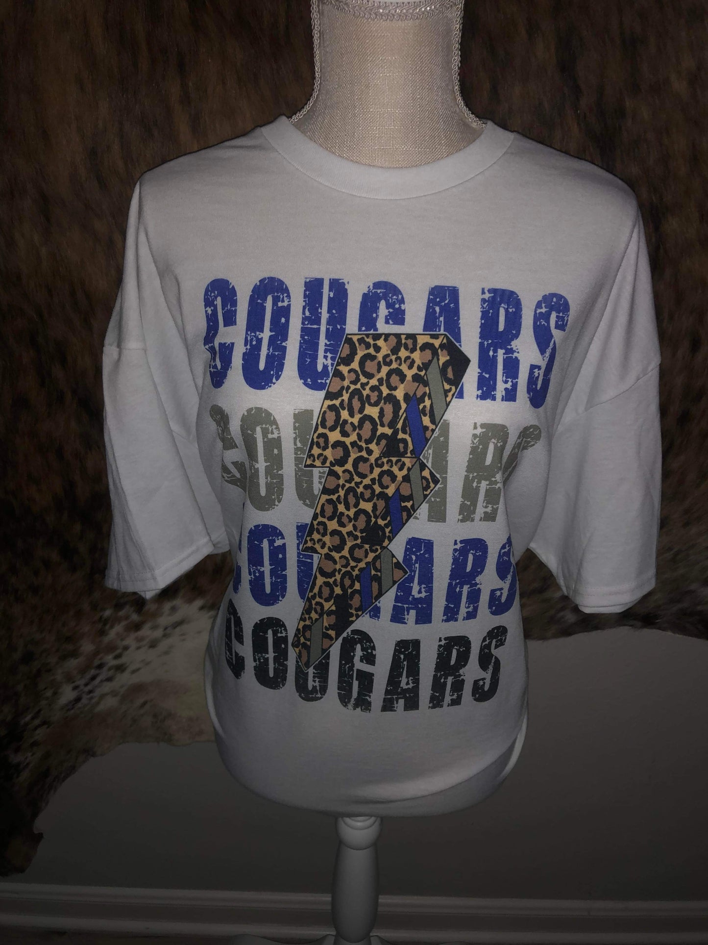 Cougars with leopard lighting